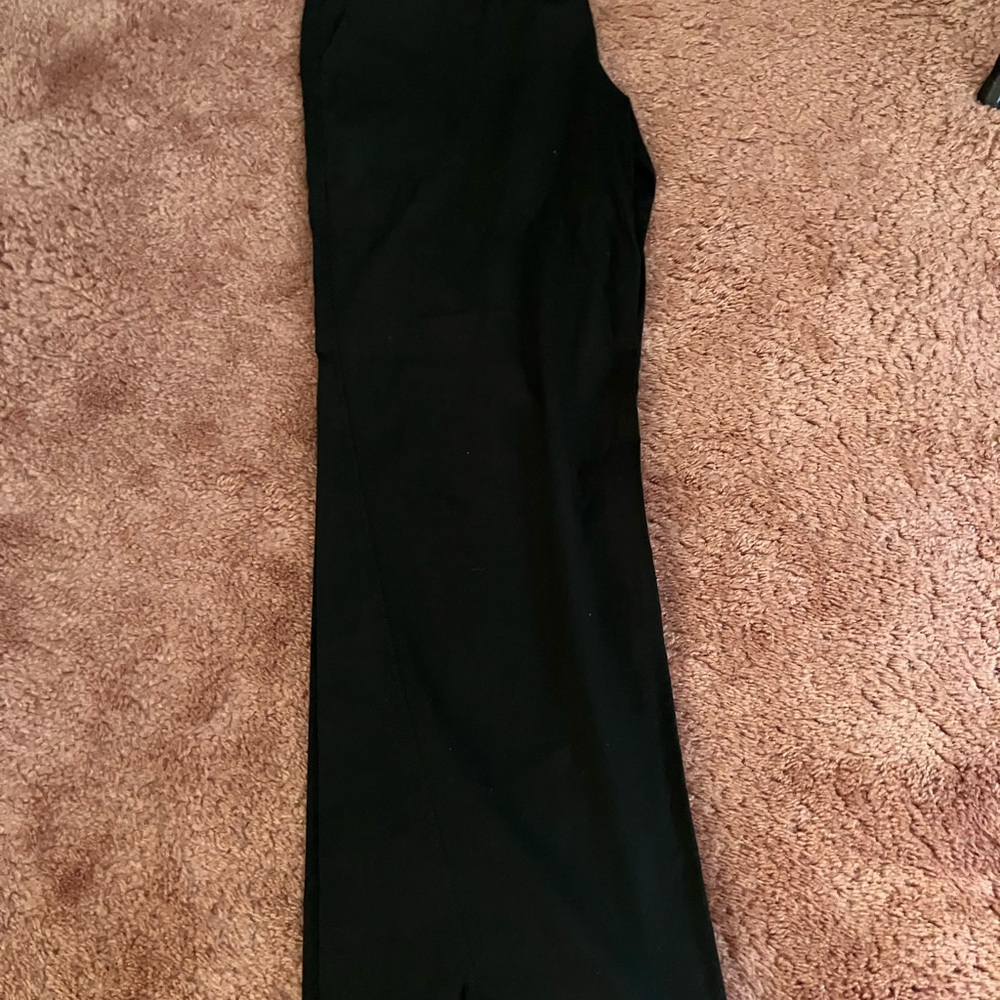 Classic James Pearse everyday black cotton pants. Drawstring waist and wide leg.